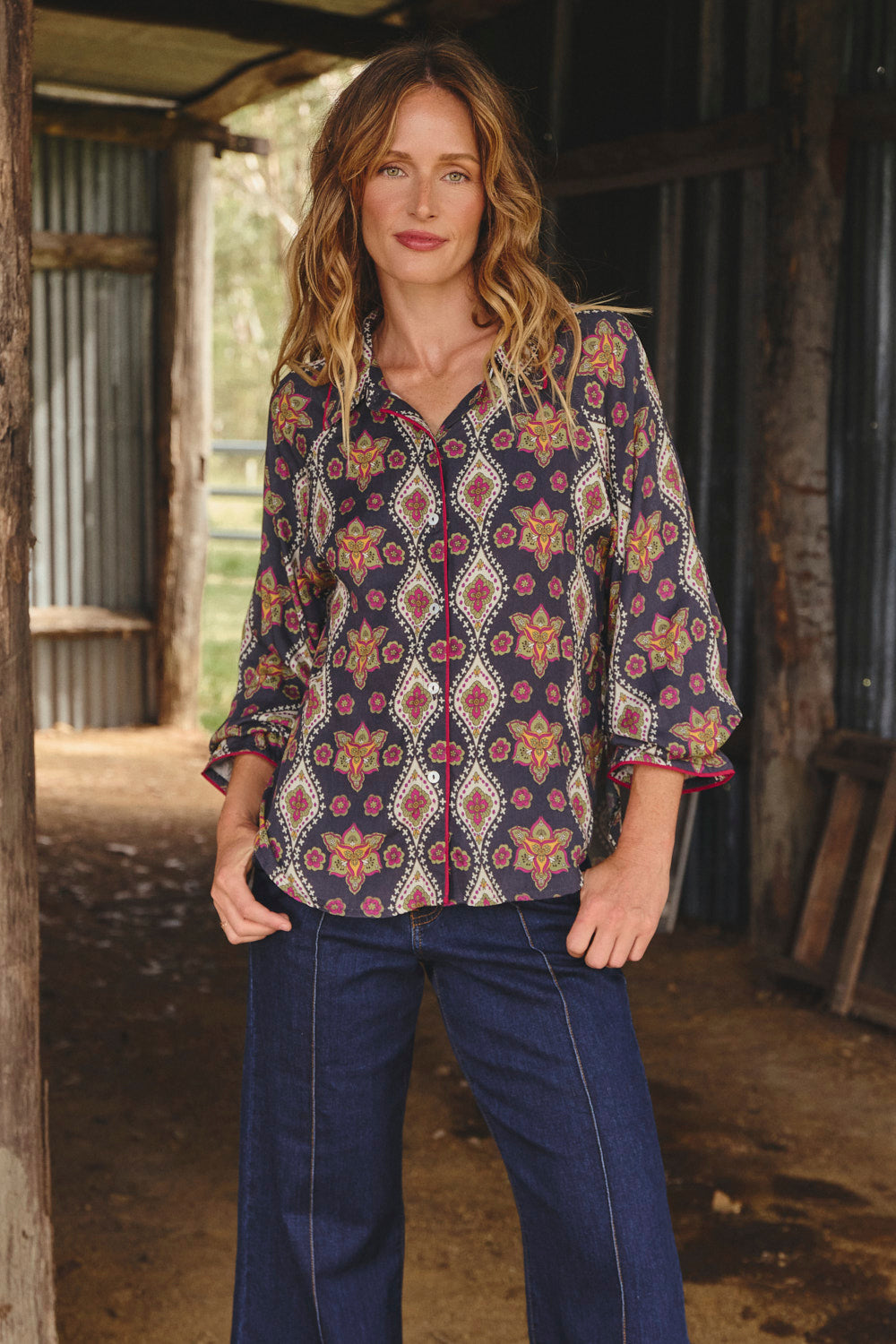 Model wearing the Ebony Frill Cuff Top in Veloura with long raglan sleeves, Adrift Clothing