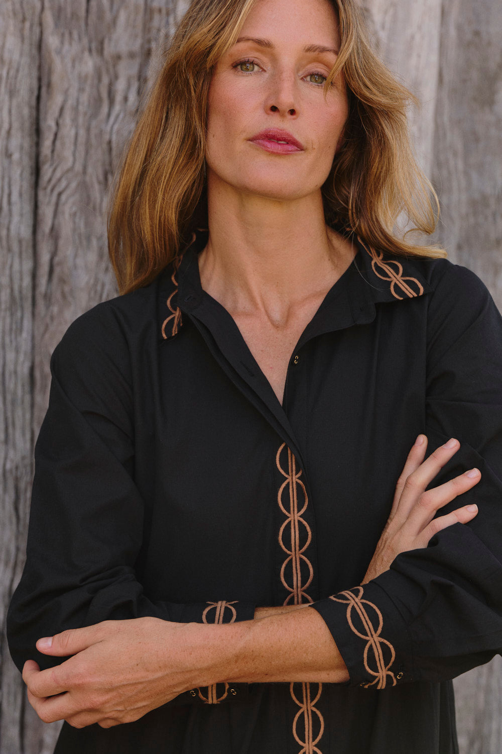 Model wearing the Winslow Button Through Dress in Black with classic two-piece shirt collar, Adrift Clothing