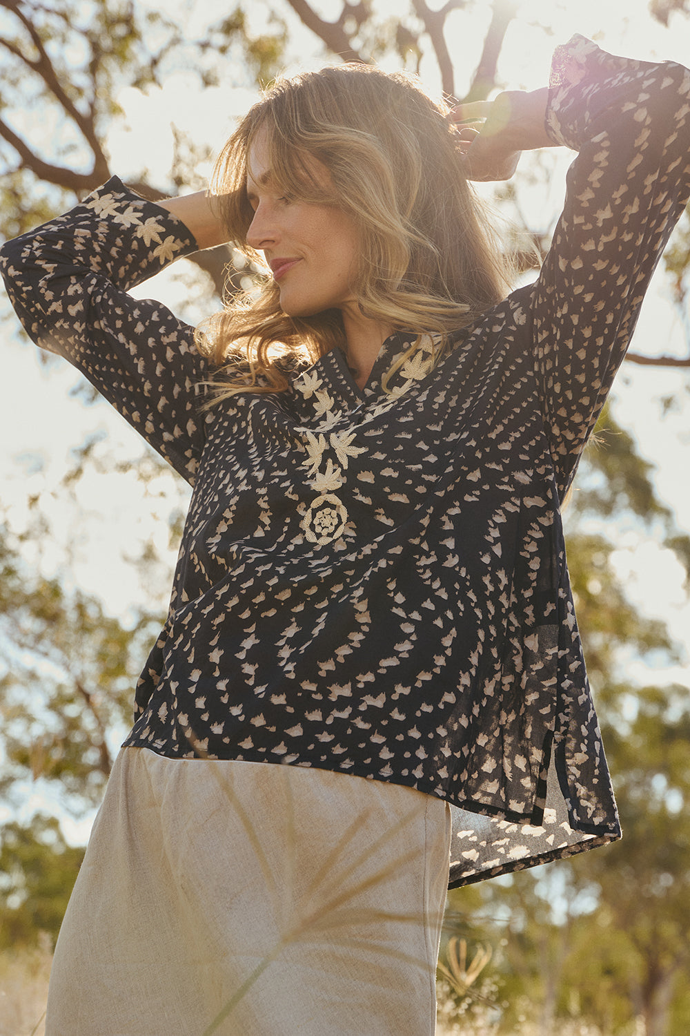 Rani Embroidered Blouse in Wild Jasmine featuring long relaxed sleeves and buttoned neck drop, Australian womenswear by Adrift